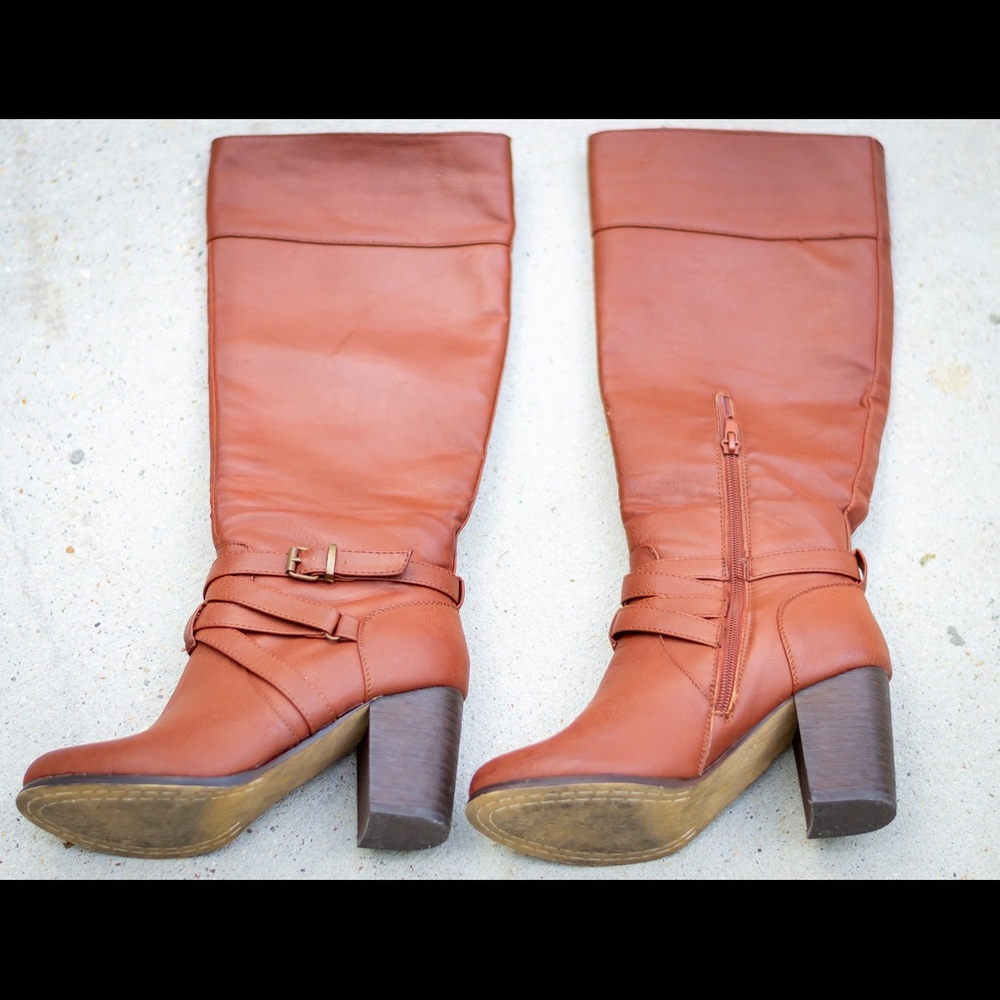 Brown heeled boots. Worn once for few hours.